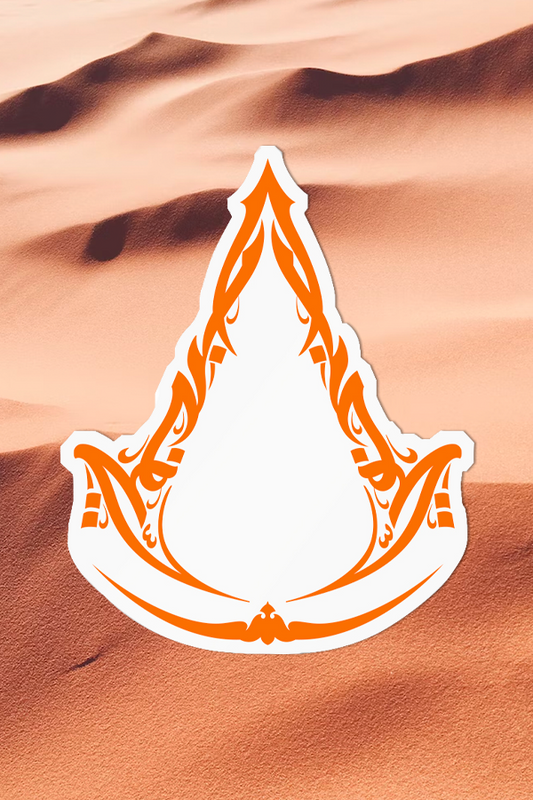 Image shows Assassin's Creed Mirage Decal facing front. The iconic Assassin’s Creed insignia is recreated for the latest installment of the series. This decal features a distinct Arabic style, apt to the period and location the new game is set in.