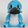 Image shows Temtem Platypet Plush facing front. Product is light-blue in color witha white stomach and has a black platypus bill. 