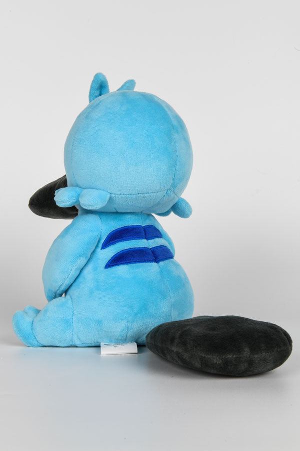 Image shows Temtem Platypet Plush facing back at a left angle. Product's arms and legs are short and stubby with the arms being slightly longer than the legs. 